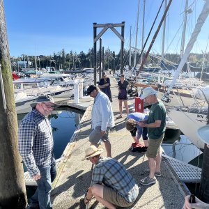 Phone overboard- taping poles together to go fishing