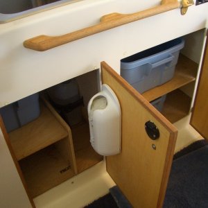 Galley cabinet storage shelves.