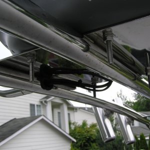 Media 'Wire run thru port arch w rubber grommet.' in album 'New radar; 18" Garmin HD.'