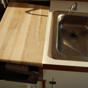 Chopping Block Extends Galley Countertop Over Flat Helm Seat
