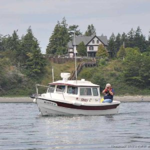 Off Port Townsend, photographing the 2010 Rowing races, and working as safety boats, (8 C-Dorys), for 2 days of races.  What a great time.