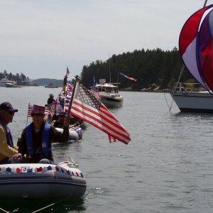 SleepyC bringing up the end of the 2011, 4th of July dingy parade Stuart Island.  The Port Townsend Yacht club put on a great show.