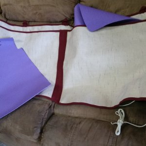 Yoga mats go into pocket for padding - rock protection.