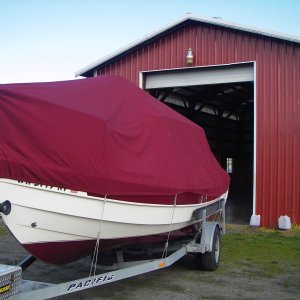 Media 'The color matched, winter storage.  Great hide-away.  Leaving the cover on, even in the barn, sure keep the boat cleaner.' in album 'All Dressed up for the 4th of July. HH Cal 09-07 Jul'