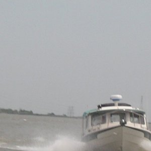 Dr. Bob in Frequent Sea - closing from astern.