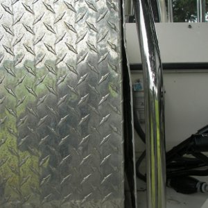 Barely room to slide a 24 inch box between the swimstep handles, so I put a huge aluminum, hinged flap on the exhaust side.