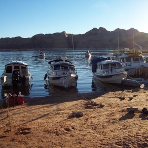 Next we have starting from the left stern towards shore Bixby\'s Cub, C-View, SEA3PO, Lori Ann a Tomcat and C-Hawk. At anchor from left to right is Bosa Nova, C-Cakes, Voyager and Traveler at Oak Canyon 9-25