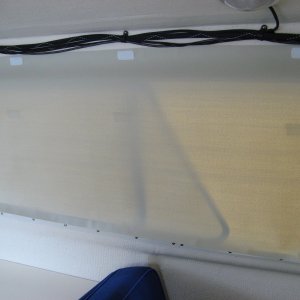 Three tabs at top to hold up large window shade when rolled