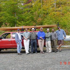 Packing up to return to civilization. Yours truly is the the old man in the middle with the blue fleece. My sons are second from the left and third from the right. My boys and I all paddle boats that we built.