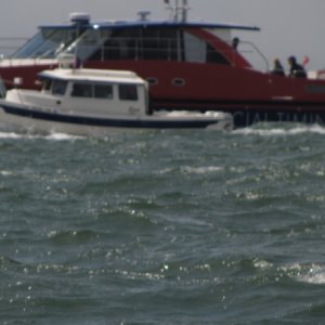 Another C-Dory during the Americas Cup looking close to the boundary lines....