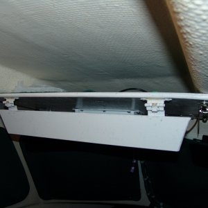 Media 'Spring loaded hinge to keep stuff up there.' in album 'Simple overhead shelf made of plywood.'