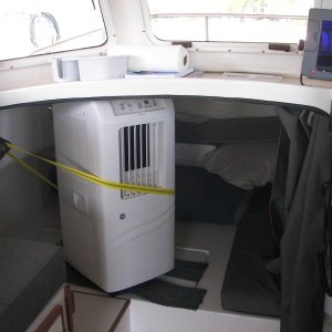 Media 'Emergency, Jack-Rigged A/C' in album 'Final 12k Btu, removable A/C. SPT brand from Pep Boys @$479. 9k Btu was $379. No drain needed. Clears 65 pts. water/day w/o drain line. Air output can be directed straight up.'