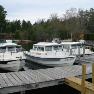 The "dories" awaiting the start of a Winnipesaukee cruise at the Y Landing Marina.