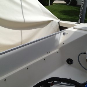 Media 'Outboard well bulkhead viewed from transom' in album 'Outboard well Bulkhead  viewed from cockpit 
Bulkheads were made using 1/2" Starboard, 
Stainless Steel Hinges, anodized 
aluminum top edge cap and 1"x1" x1/8" 
aluminum brackets at upper top corners'