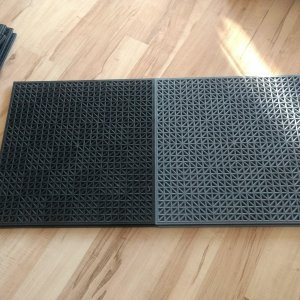 Bought some garage floor tiles from Costco. Choices were all black or gray/black.

I"m hoping this will help keep the feet clean and dry.