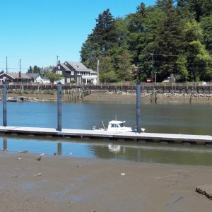 It is across the river from the old Polson "mansion" (now a logging museum) just to the left.