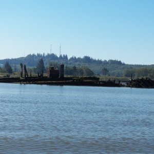 On a spit across from Aberdeen is a ruined wooden ship with only the skeletal frame and the steam boiler remaining.