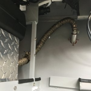 Exhaust wrapped in Header insulation & stainless Monel wire.
