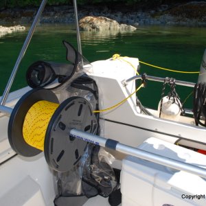 Stern tie reel mount using boat hook - simple! 
July 2010