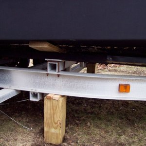 Very important to support the trailer at the load bearing points during and after the lift.  (I have 3 supports on each side of the trailer aft, just forward of amidships, and at the bow).