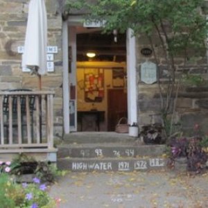 The marina office is in a three story stone farmhouse. The office on the first floor showers and bathroom on the second floor. Owner lives on the third floor. Notice years showing high water marks on the steps. They sell good coffee for 25 cents a cup. The marina is our favorite of all time.