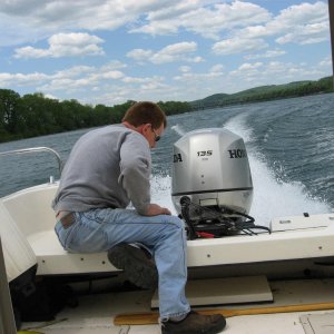 mechanic listening to engine