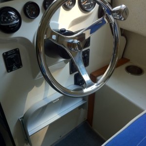 Media 'New Edson Comfort Grip Power wheel and helm step.
Smaller diameter and smooth stainless steel makes it easier for me to slide into the helm seat.' in album 'New wheel and helm step. I really like the wheel but the helm step is probably even a better addition. It makes it a lot more comfortable cruising long distances and is also nice when a youngster gets to drive the boat. Both are SIMPLE installs.'