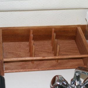Media 'Removable dish rack - made with sheet of oak and eight 3" pieces of 3/8" dowels' in album 'Inspired by others - galley rack made with 2 1/2" wide oak with two 3/8" dowels running the length.'