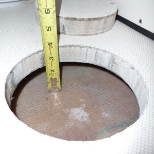 2. Cockpit Floor Access showing a grey foam core. This void space under the cockpit floor had collected several gallons of water in the first 6 weeks in the water, due to a faulty instalation of the salt water wash down pump pick up.