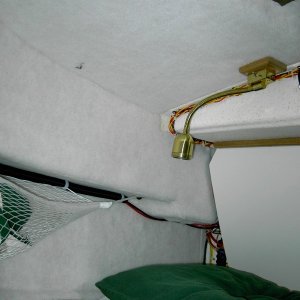 (Lynn Marie)Carpet on cabin roof, side, deck, & hull @ starboard by electrical panel cover.
