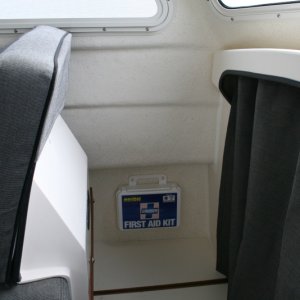 Media 'First Aid kit secured to Port in-side hull with Velcro stips' in album 'Fire extinguisher installed on port side of rear door - used the screw from the window frame.'