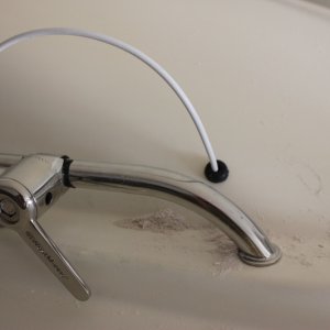 Media 'Antenna cable through cabin roof.' in album 'I used a tire air valve to get the antenna cable through the roof.  It is a snug fit; hopefully water will stay outside of the cabin.'