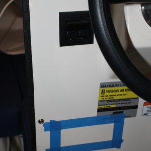 Media 'Ready to cut out helm to install radio.' in album 'I used a tire air valve to get the antenna cable through the roof.  It is a snug fit; hopefully water will stay outside of the cabin.'