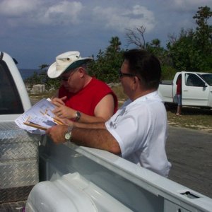 Media 'Craig isn\'t smiling so much in this one--this is when he found out that the shipping was $7,500.  Egads!' in album 'Hunky Dory is finally home!  Here is her first Little Cayman sunset.'