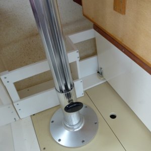 Chart and book rack under table