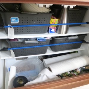 Custom shelving under sink made from starboard
