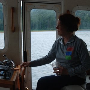 Margaret at the helm of the NT37. Wine helps