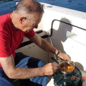 24 July Montague Harbour
 Joe heating our dinner