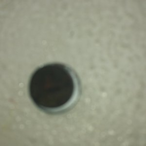 Media 'The inside of the plug, sorry it's blurry but the threads had moderate exhause corrosion, nothing out of the ordinary.' in album 'Finally got the cover off.  Located the plug'