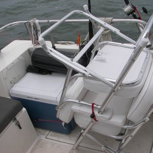Easy way to get big chairs out of the way when the cockpit got busy. Of course, they could be stowed in the forward bunk.