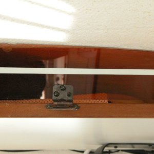 Media 'Close up view of hinge and its brass hardware.' in album 'Shelf door with 4 snap hinges( 2 packages) made from 1/4"  tempered Plexiglass.
Though not titled, the Pantographic replacement Arms are visible with the original 11.5" blades mounted. Replacement 14" SS curved blades are 'in house' ready to install when these wear out.'