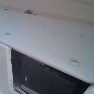 Media 'starboard side V-berth access hatch w.AC unit' in album 'port access hatch w.sub woofer cabinet and air conditioning duct'