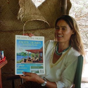 Richenda Eddy, operator of the Tusitiri tours with her husband, holds up August 2004 Architectural Digest where they were profiled