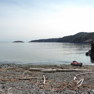 Taking a stretch break on a beach in Telegraph Bay