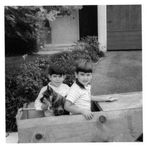 My first boat 1965 (I'm on the right).  Yes, it floated... sort of.