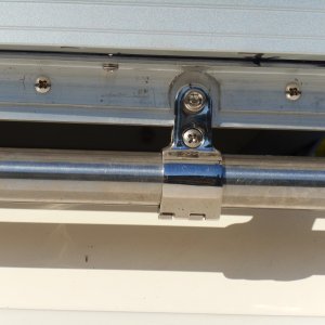 Rail clips from Defender.  Easy off and on.