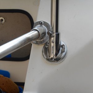 I don't like drilling holes in the boat.  The only holes drilled were to mount the rear frame and one hidden under the rear roof to run wiring.