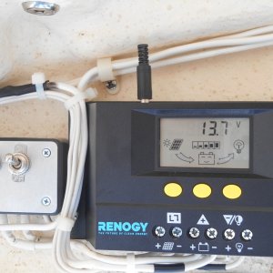 Media 'This controller, while slightly more expensive, is much more versatile.' in album 'I used this idea for several years and realized 200 watts was overkill for me.  I remounted one 100 watt panel on standoffs on the middle of the roof.  This clears the hand rails and looks neater.'