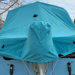 Added the cover over the motor well to keep water from forming ice in the low spot. Works great.