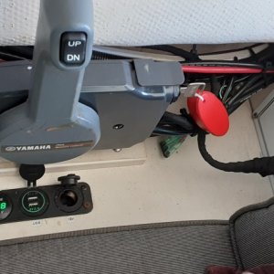 Throttle, DC plugs, and AC/DC main switch panel located next to captains station